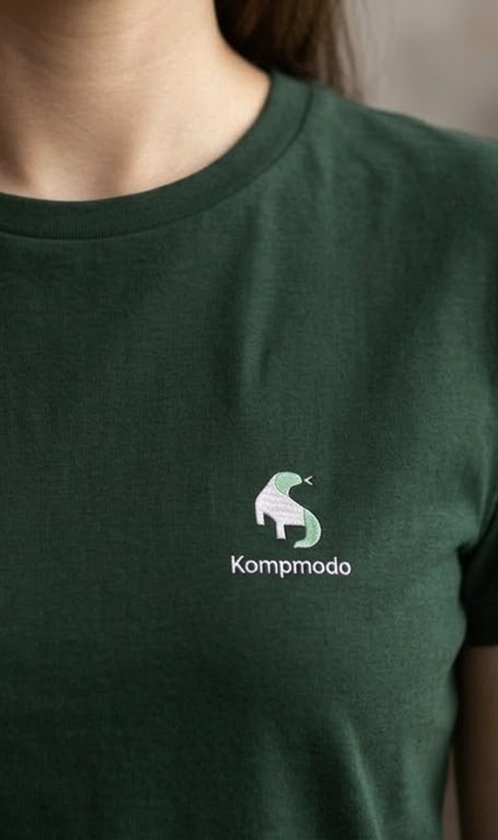 Kompmodo logo on shirt closeup